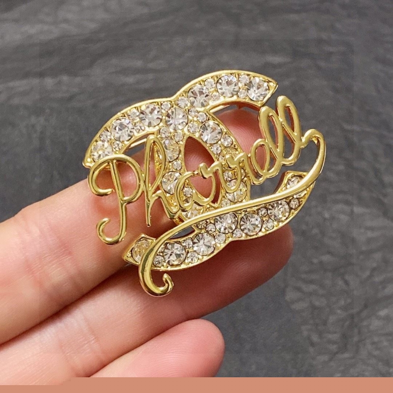 Ch*el brooches